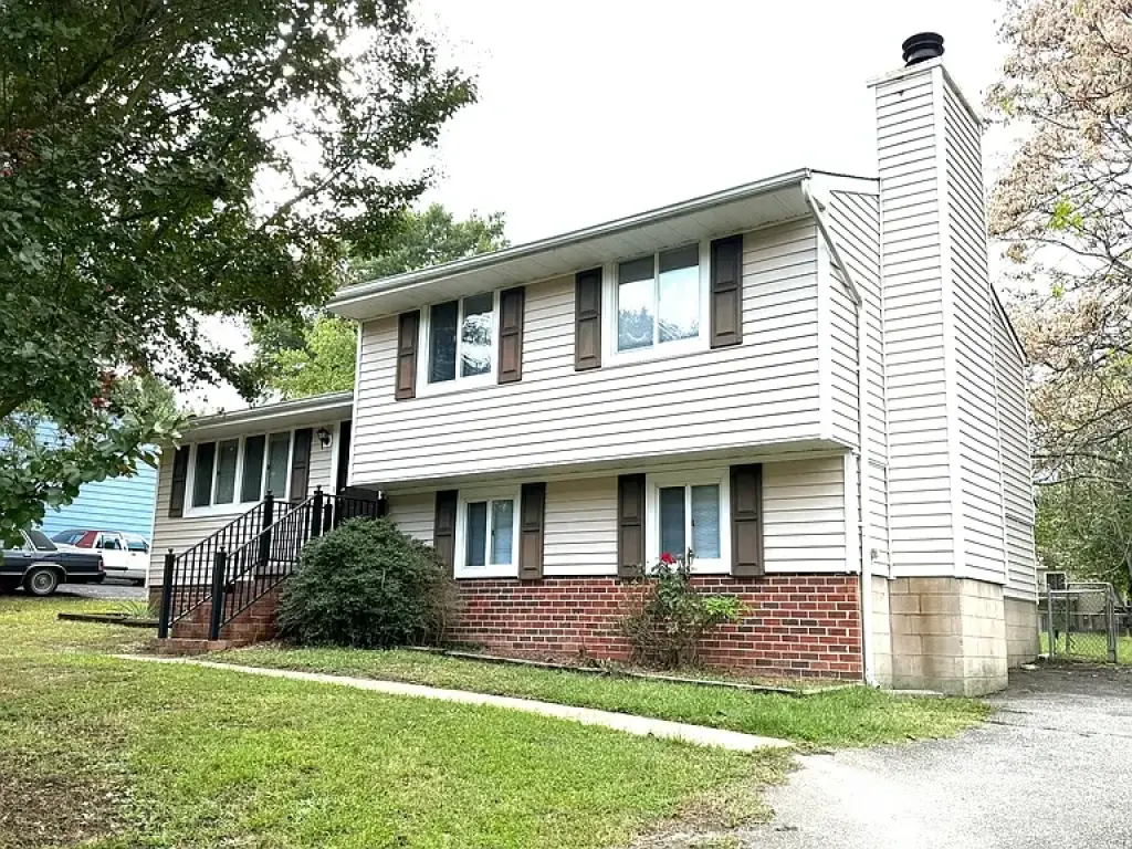 Spacious single-family home with three distinct living areas.