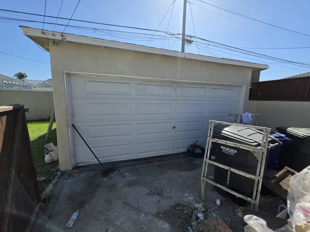 Pre owned roll up two car garage door