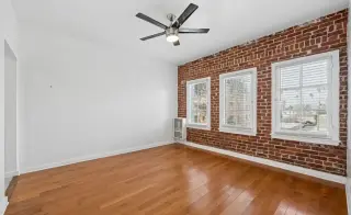 Luxury Fully Renovated 1-Bedroom w/ Stunning Exposed Brick Walls!
