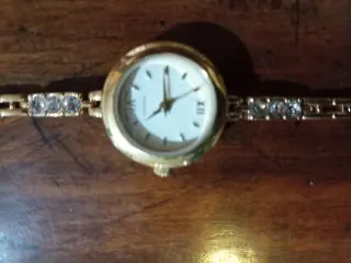 RELOJ AVON BANADO EN ORO BUEN ESTADO