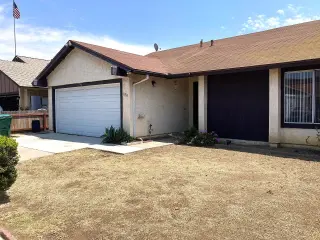 this comfortable 3-bedroom, 2-bathroom single-family home