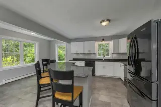 Inviting Cul-de-Sac Home with Granite Kitchen and Farmer’s Porch