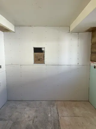 Drywall y taper finishing