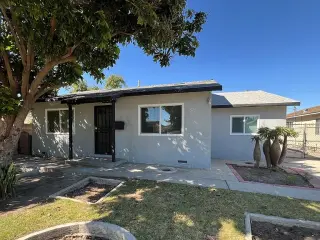 This charming older home features, mature trees in the front yard
