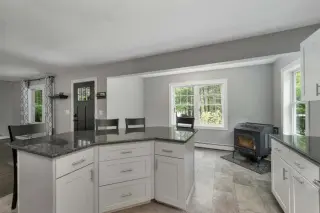 Inviting Cul-de-Sac Home with Granite Kitchen and Farmer’s Porch