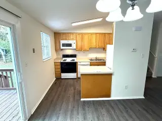 Spacious single-family home with three distinct living areas.