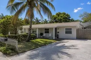 Freshly painted and ideally located just minutes from Mizner Park