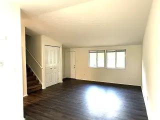 Spacious single-family home with three distinct living areas.