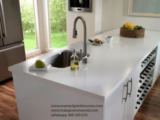 CORIAN en tableros de cocina, caunter de atención al público, baños, curvos