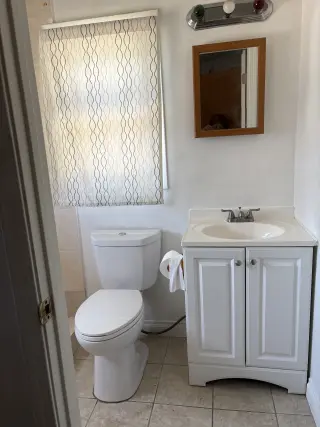 One bedroom in three bedrooms house for rent.