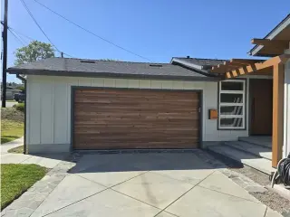 Woodlike plank garage door