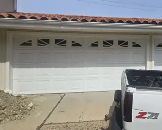 Pre owned roll up garage door