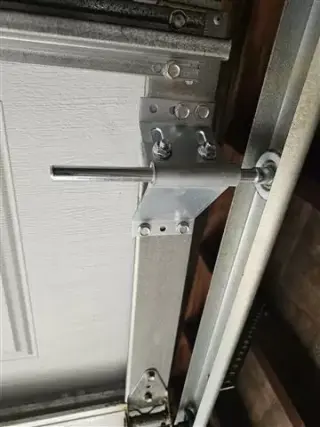 Top panel roller hinge