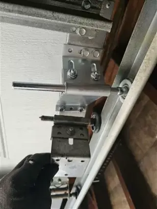 Top panel roller hinge