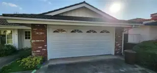 Garage door with top windows