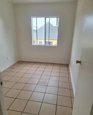 56TH ST. Y FIGUEROA APT 1 REC.