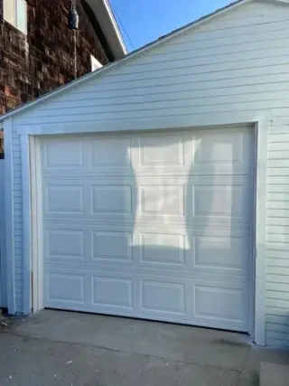 Single rollup garage door