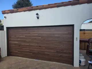 Plank wood grain garage door
