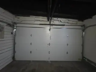 Plank wood grain garage door