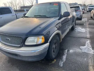 Ford F-150 1999 4 puertas Lariat Cabina Extendida Stepside SB