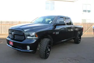 2014 RAM 1500 4WD Crew Cab 149" Sport