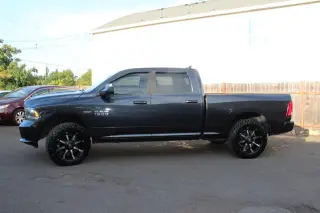 2014 RAM 1500 4WD Crew Cab 149" Sport