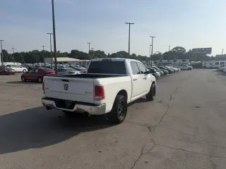 2014 RAM 1500 4WD Crew Cab 140.5" Laramie