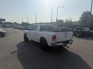 2014 RAM 1500 4WD Crew Cab 140.5" Laramie