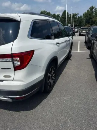 Honda Pilot 2022 Touring 4dr SUV con asientos de capitán traseros