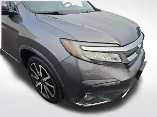 Honda Pilot 2021 AWD Touring SUV de 4 puertas con asientos tipo capitán en la segunda fila