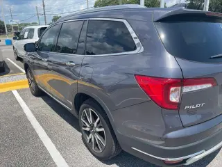 Honda Pilot 2020 Touring 4dr SUV con asientos de capitán traseros