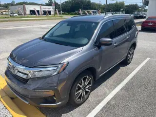 Honda Pilot 2020 Touring 4dr SUV con asientos de capitán traseros