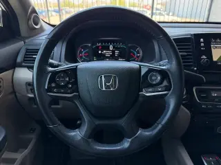 Honda Pilot 2021 Touring SUV 4 puertas con asientos traseros tipo capitán
