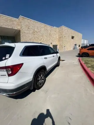 Honda Pilot 2021 Touring SUV 4 puertas con asientos traseros tipo capitán