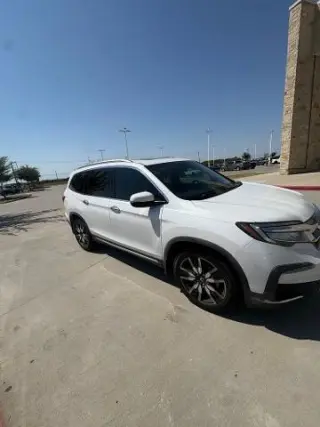Honda Pilot 2021 Touring SUV 4 puertas con asientos traseros tipo capitán