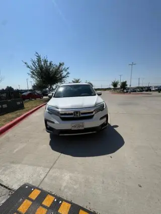 Honda Pilot 2021 Touring SUV 4 puertas con asientos traseros tipo capitán