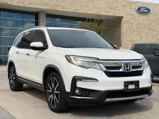 Honda Pilot 2019 Touring 4dr SUV con asientos del capitán traseros