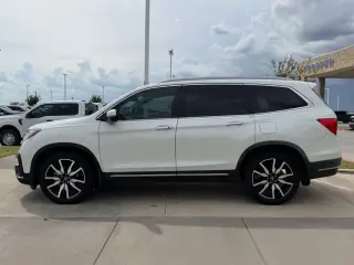 Honda Pilot 2019 Touring 4dr SUV con asientos del capitán traseros
