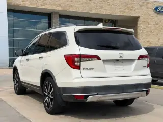 Honda Pilot 2019 Touring 4dr SUV con asientos del capitán traseros