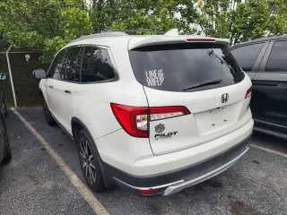 Honda Pilot 2020 AWD Touring 4dr SUV con asientos del capitán trasero