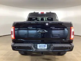 Ford F-150 2022 4x4 Lariat 4dr SuperCrew con puertas abiertas 6.5 ft.