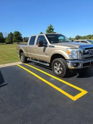 Ford F-350 Super Duty 2011 4x4 Lariat 4 puertas Cabina Crew Cab Caja de 6.8 pies SRW Pickup