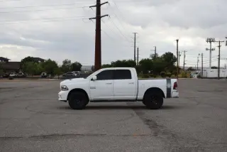 RAM 1500 4WD Crew Cab 140.5" Sport 2014