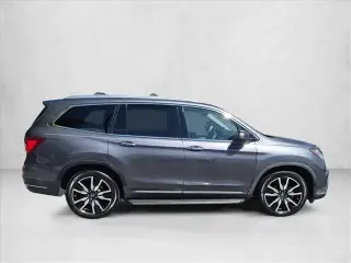Honda Pilot 2020 AWD Touring SUV de 4 puertas con asientos traseros de mando