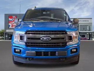 Ford F-150 2019 4x4 XLT 4dr SuperCrew 5.5 ft. SB en Llegada Reciente! El odómetro está 20831 millas por debajo del promedio del mercado! Ford F-150 XLT Velocity Blue Metálico 4WD 3.5L V6 EcoBoost Automático de 10 velocidades Aunque se ha hecho todo lo pos
