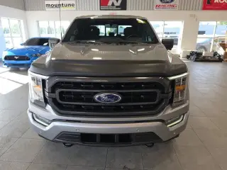 Ford F-150 2022 4x4 XLT 4p SuperCrew 5.5 ft. SB plateada metálica CARFAX de un solo propietario. 19/24 MPG ciudad/carretera 2022 Ford F-150 XLT 4WD 10 velocidades automática 2.7L V6 EcoBoost 4WD.¡PRECIOS AL POR MAYOR PARA TODOS! Inspección de segu