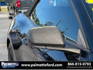Ford Mustang 2015 EcoBoost Premium 2dr Convertible en Negro 2015 Ford Mustang EcoBoost Premium RWD 6-Velocidades Automática con Select-Shift EcoBoost 2.3L I4 GTDi DOHC Turbocharged VCT Ubicacion en 1625 Savannah Hwy en Charleston Carolina del Sur. Llama a