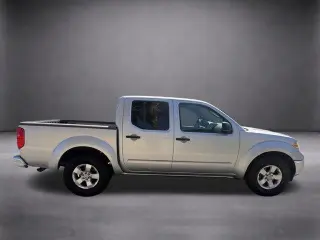 Nissan Frontier 2009 4x2 LE Crew Cab Short Bed 4dr 5A