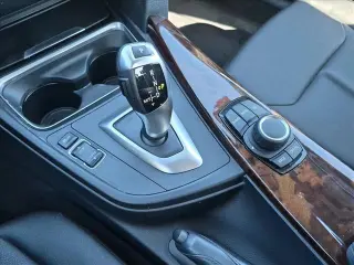 BMW Serie 3 2014 328i 4dr Sedán SULEV