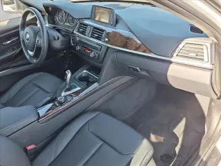BMW Serie 3 2014 328i 4dr Sedán SULEV